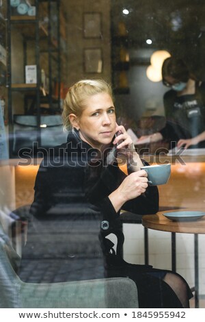 Foto stock: Close Up Blond Woman Calling Through Phone