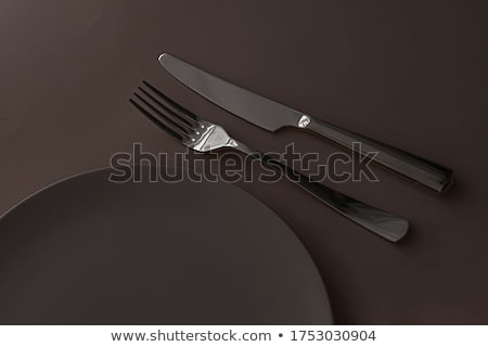 Stok fotoğraf: Empty Plate And Cutlery As Mockup Set On Dark Brown Background Top Tableware For Chef Table Decor A