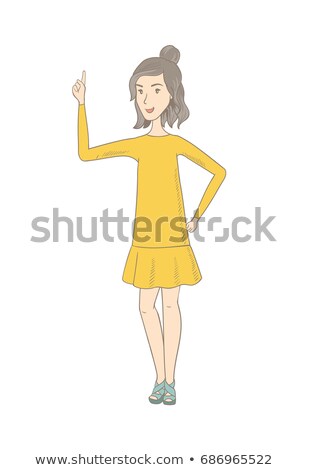 Foto stock: Caucasian Hippie Woman Pointing Her Forefinger Up