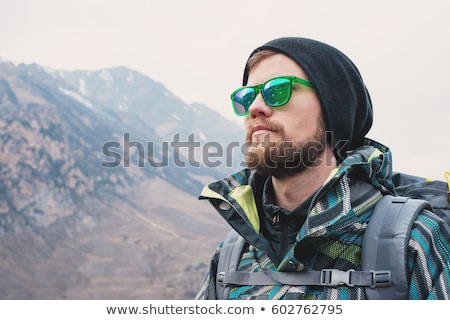 Stock fotó: Man Wearing Sunglasses On Mountain
