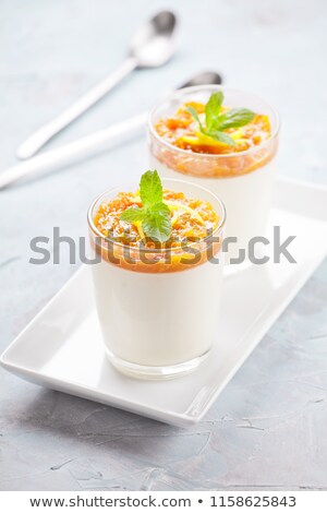 Panna Cotta Glasses With Mango Foto stock © mpessaris