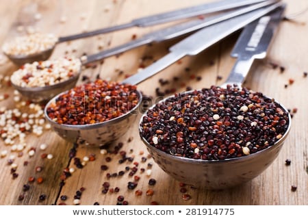 Stok fotoğraf: Mix Of Quinoa Grain In Metal Measuring Spoons