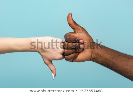 Zdjęcia stock: Hands Showing Thumbs Up And Thumbs Down Signs