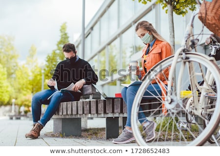 Сток-фото: Two College Students Learning While Keeping Social Distance