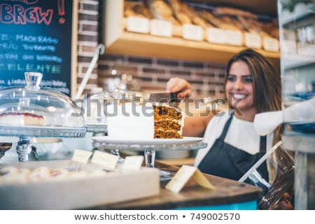 Zdjęcia stock: Two Young Women Working In A Bakery