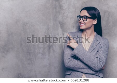 ストックフォト: Business Woman Standing And Pointing At Copy Space