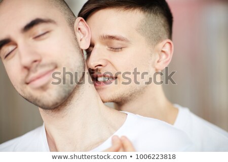 Androgynous Man Touching His Neck Stockfoto © Pressmaster