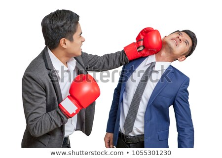 Stock foto: Young Fighter Is Giving A Finishing Punch