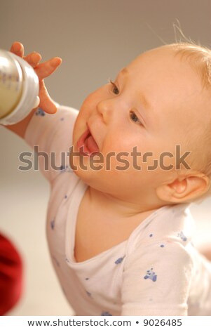 Nursling With Milk Bottle Foto d'archivio © VojtechVlk