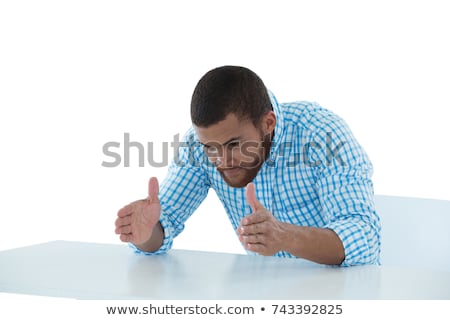 Zdjęcia stock: Male Executive Pretending To Hold An Invisible Object