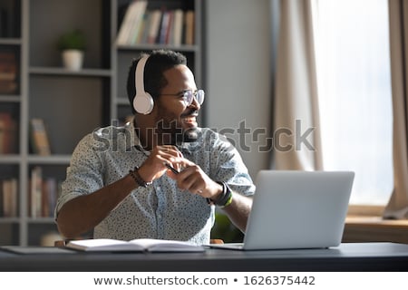 Foto stock: Student Looking At Laptop And Listening To Music On Headphones Vector Isolated Illustration