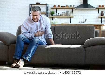 Stockfoto: Man Suffering From Chest Pain