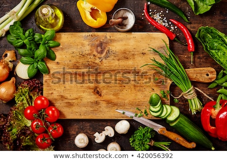 Foto stock: Chopped Tomatoes And Knife On Cutting Board