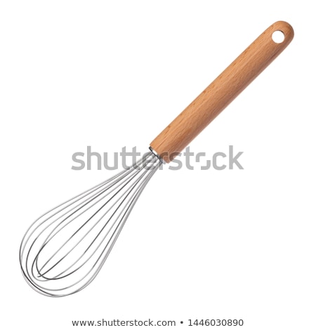 Stockfoto: Egg In The Culinary Whisk