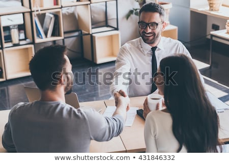 Сток-фото: Estate Agent With Young Couple