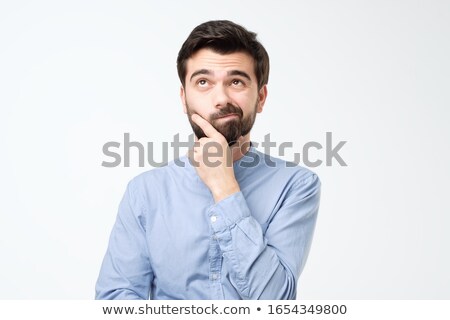 Pensive Businessman Rubbing His Chin Foto stock © Koldunov