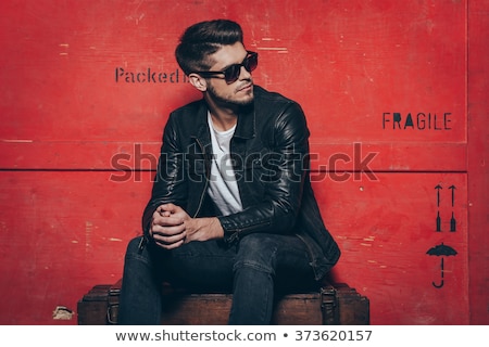 Сток-фото: Fashionable Young Man With Leather Clothes On