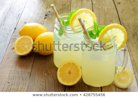 Foto stock: Summer Citrus Lemonade Drink With Fresh Lemon And Mint