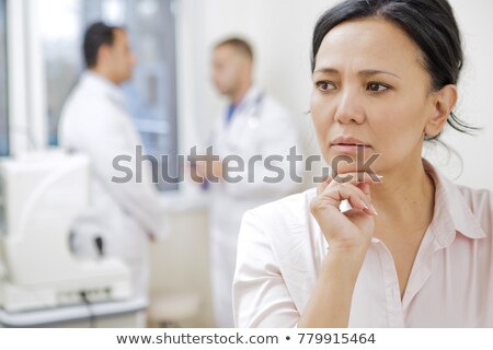 Stok fotoğraf: Asian Doctors Looking Away