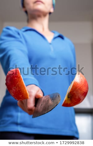 Stock foto: Slices Of Apples And Female Hand