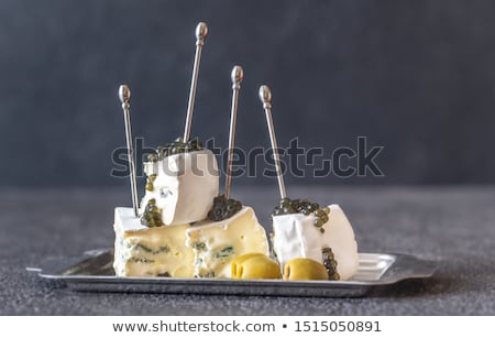 Foto stock: White And Blue Mold Cheese With Black Caviar