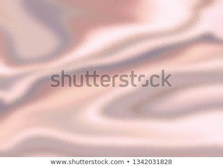 Imagine de stoc: Pearls On A Silk Fabric Background