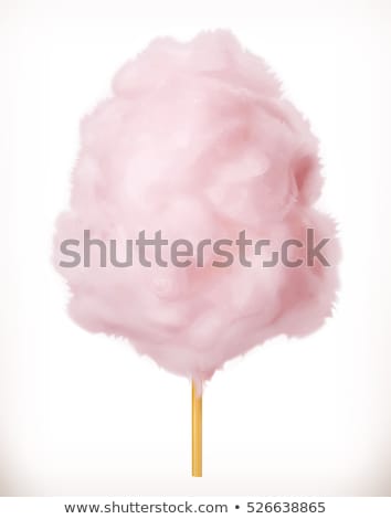 ストックフォト: Child Is Eating Cotton Candy With Fun