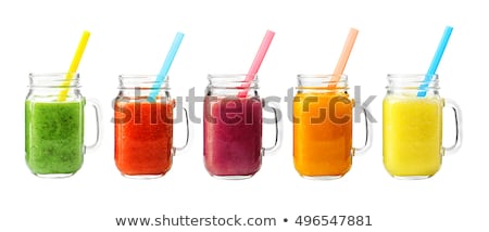 Stockfoto: Green Smoothie In A Cocktail Glass On A White Background