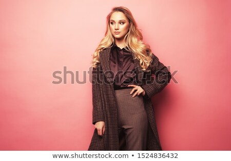 Stock photo: Vogue Style Photo Of A Blond Beauty Over White Wall