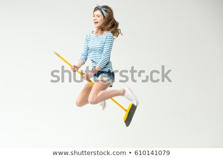 Stock fotó: Young Girl With Broom Smiling