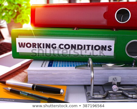 [[stock_photo]]: Working Conditions On Ring Binder Toned Image