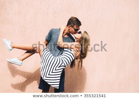 Foto stock: Teenage Couple At Fun Fair