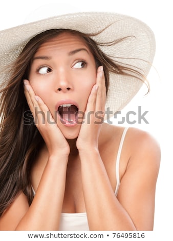 Foto d'archivio: Portrait Of A Shocked Asian Girl In Summer Hat