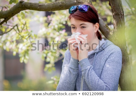 Stock fotó: Young Woman Suffering Spring Pollen Allergy