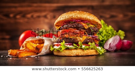 Burgers Placed On French Fries [[stock_photo]] © Jag_cz