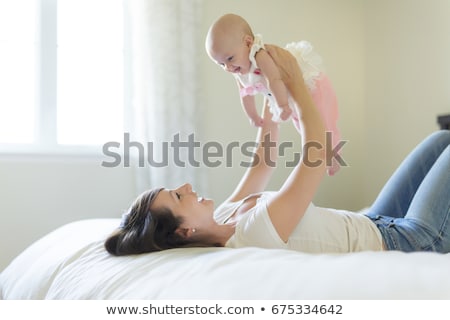 Stock fotó: Portrait Of Mother With Her 3 Month Old Baby In Bedroom