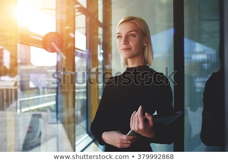 Stock photo: Beautiful Business Woman Thinking About Something While Working