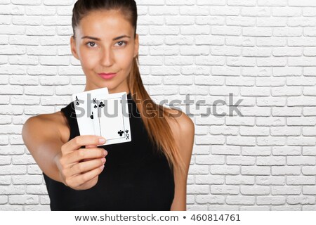 Foto stock: Atractive Girl Playing Cards Isolated On White Background
