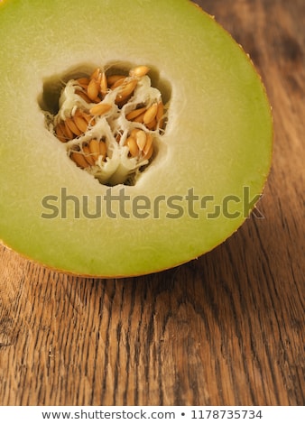 Stok fotoğraf: Tasteful Fresh Melon Fruit Slices On The Table