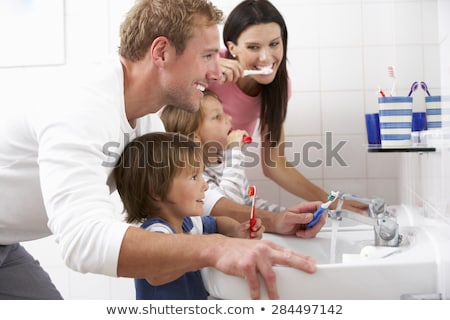 Stock foto: Family Are Brushing Teeth