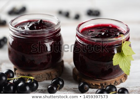 Zdjęcia stock: Black Currant In Wooden Spoons On Wooden