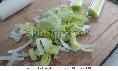 Foto d'archivio: A Leek Being Cut