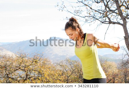 Stock fotó: Athletic Woman Stretching Her Thigh