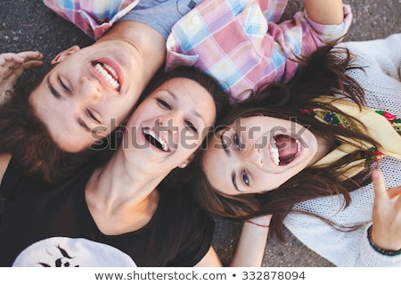 ストックフォト: Top View Close Up Of A Smiling Young Teenage Girl