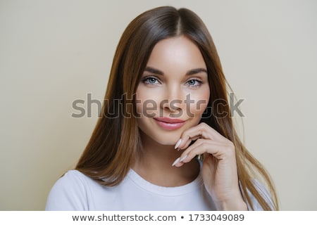 Zdjęcia stock: Photo Of Good Looking Gorgeous Brunette Woman Keeps Hand On Head Has Long Dark Hair Combed On One S