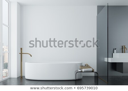 Stockfoto: Detail Of A White Wall With Tiles And Light Switch