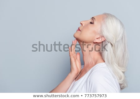 Stock photo: Beautiful Middle Aged Woman With Cream