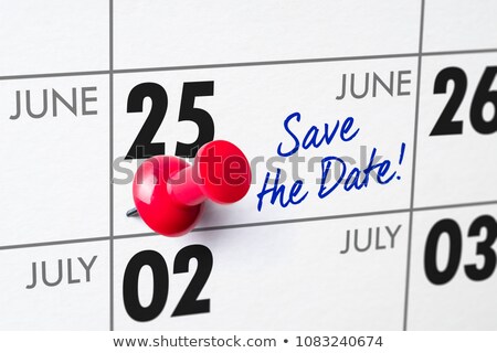 Foto d'archivio: Wall Calendar With A Red Pin - June 25