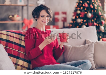 Stockfoto: Happy Woman With Smartphone In Winter
