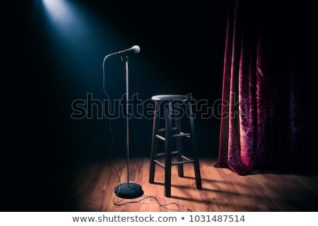 Zdjęcia stock: Stand Up Comedy Stage - Microphone On Stool In Ray Of Spotlight